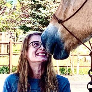 happy-woman-nose-kiss-horse